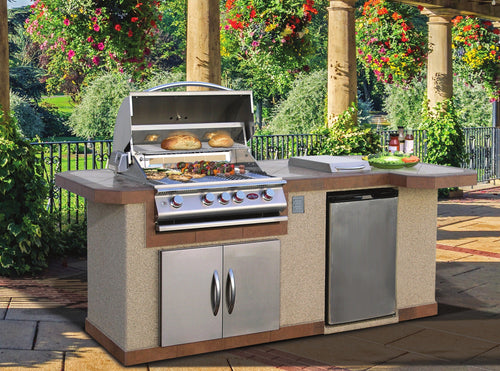 Cal Flame Avalon Q outdoor kitchen island in a garden courtyard