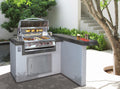 Cal Flame Maui Q outdoor kitchen island in a landscaped backyard